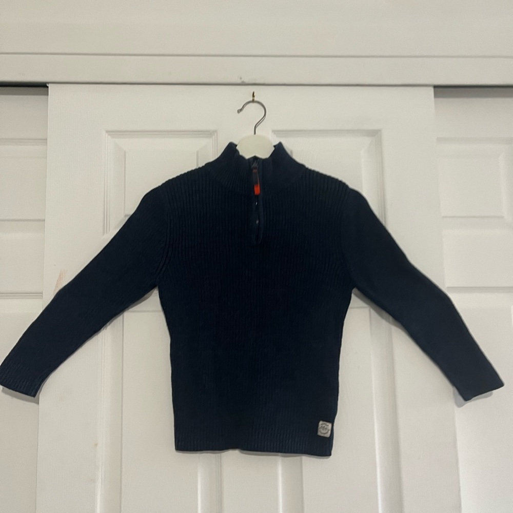 Boy size 6/7 Navy Blue Long Sleeve Sweater with zip-up high collar